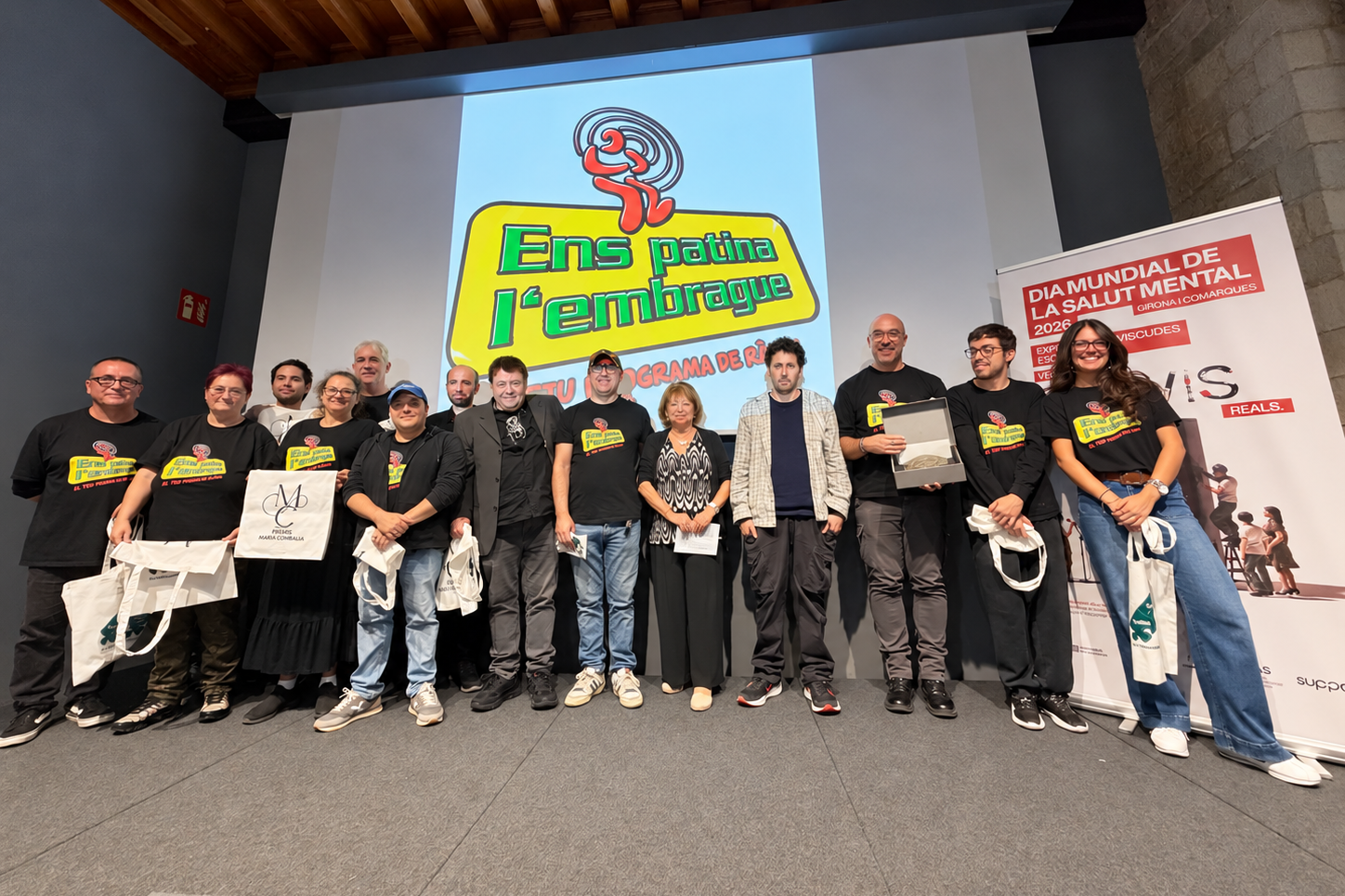 Foto de grup: El programa de ràdio Ens Patina l'Embrague, premi Maria Combalia 2026